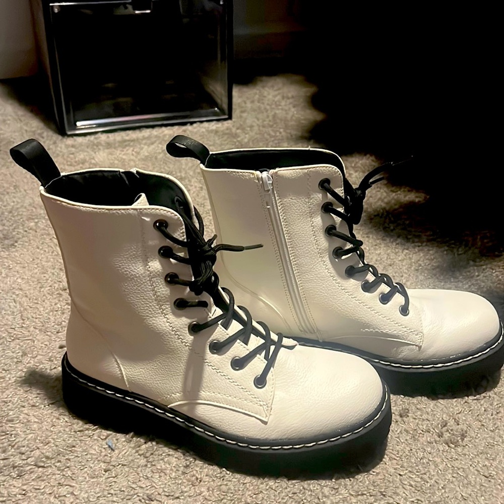 Brand new white boots.